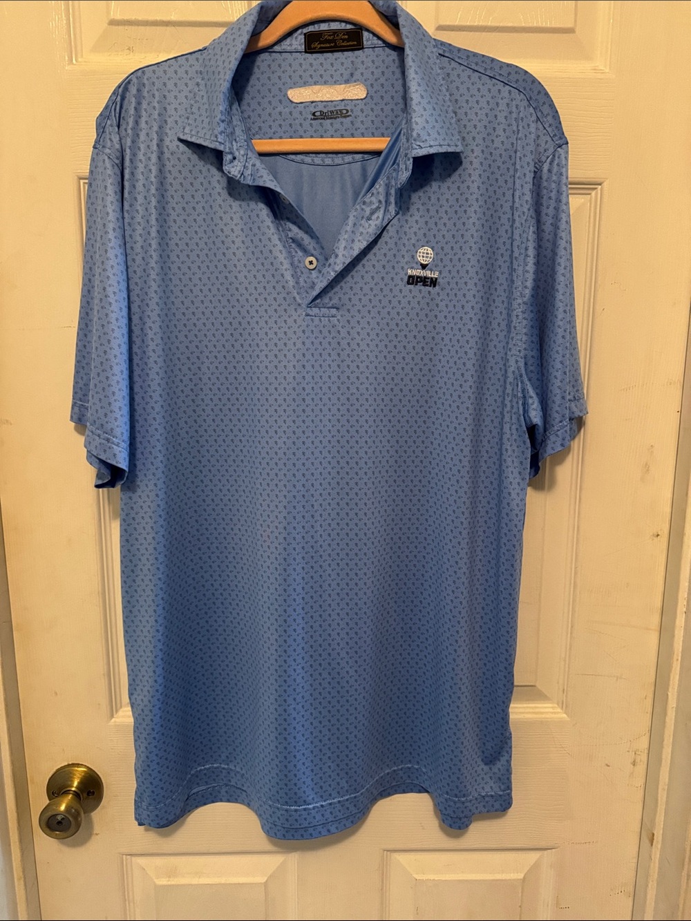 Greg Norman Light Blue Golf Polo with Embroidered Knoxville Open Logo
